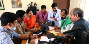 Indian filmmakers collaborating on a documentary project.