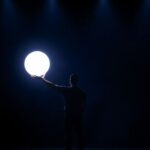 Filmmaker presenting a glowing idea.