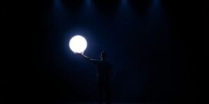 Filmmaker presenting a glowing idea.