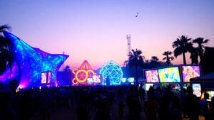 Futuristic festival with colorful lights and diverse crowd
